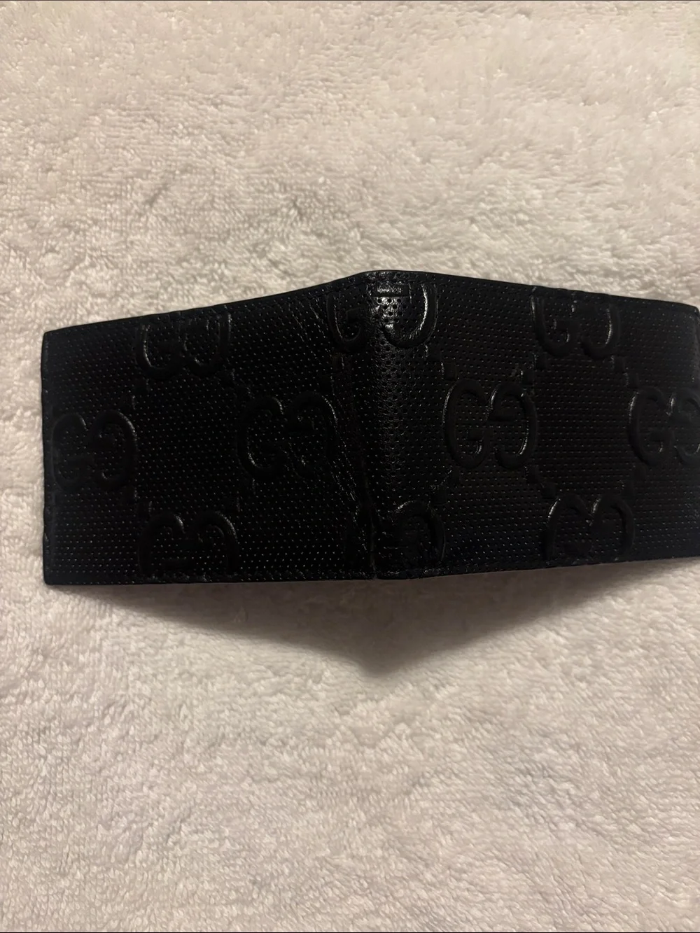 Gucci Black Perforated GG Embossed Leather Wallet